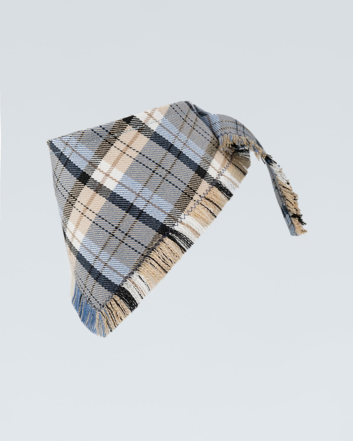 Light blue checked dog scarf laid flat with one tie end extended